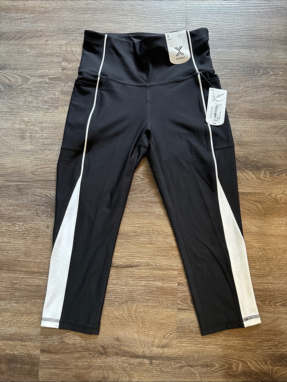 Xersion Black capris with White Side Panels - women’s
